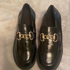 Black loafers